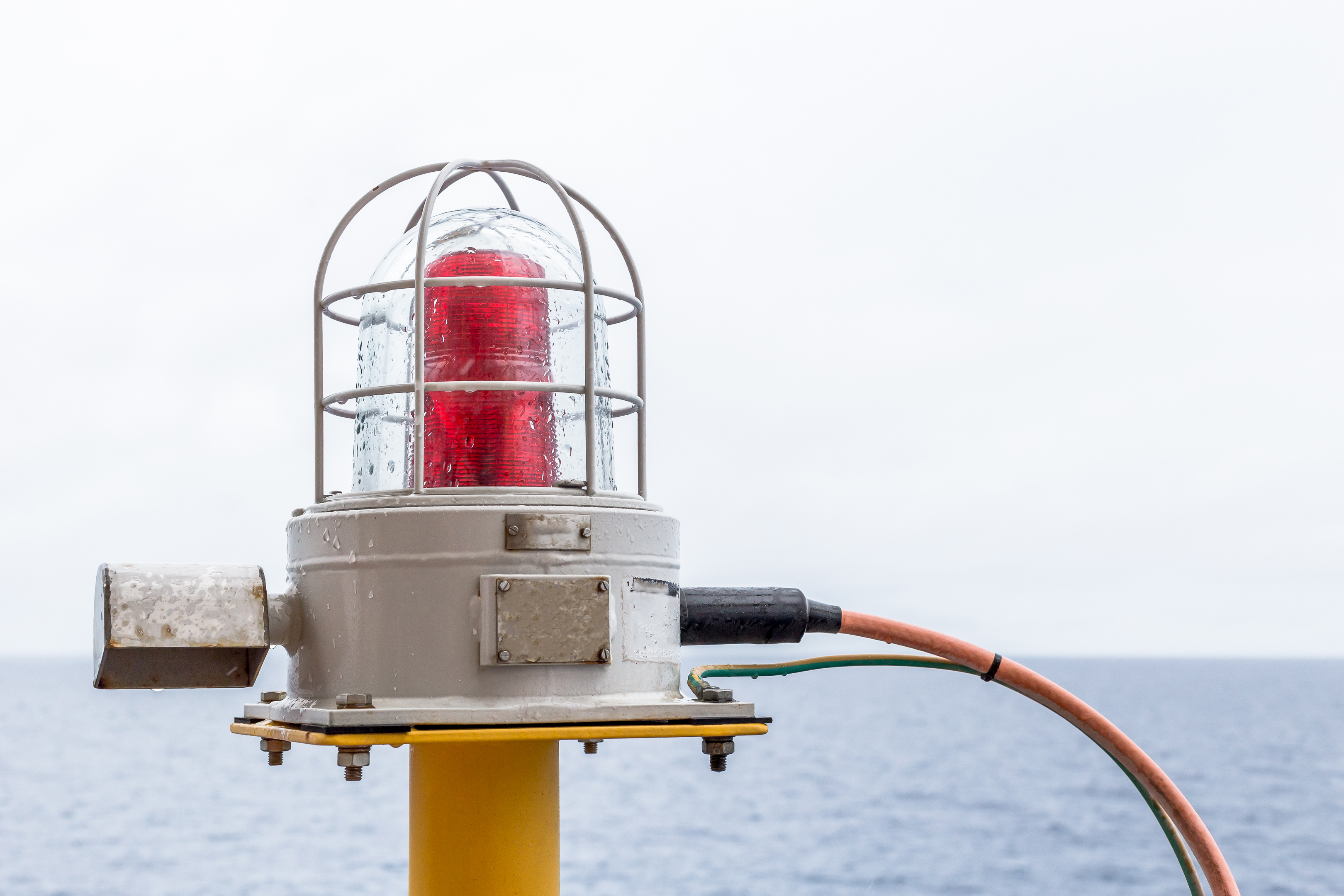 navigation lights bulbs on the oil &amp; gas offshore wellhead platform.